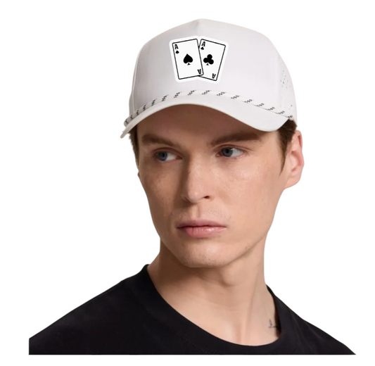 White hat / golf hat with a poker design patch on it